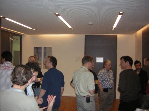 Gathering in front of the presentation room during the coffee break (1)