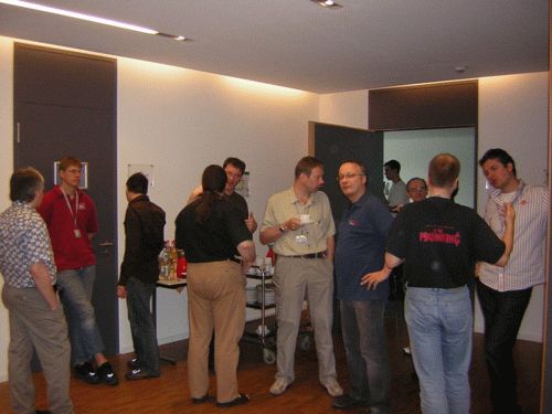 Gathering in front of the presentation room during the coffee break (2)