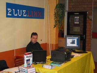 The booth of Bluelink with books from C&L publishers in the foreground